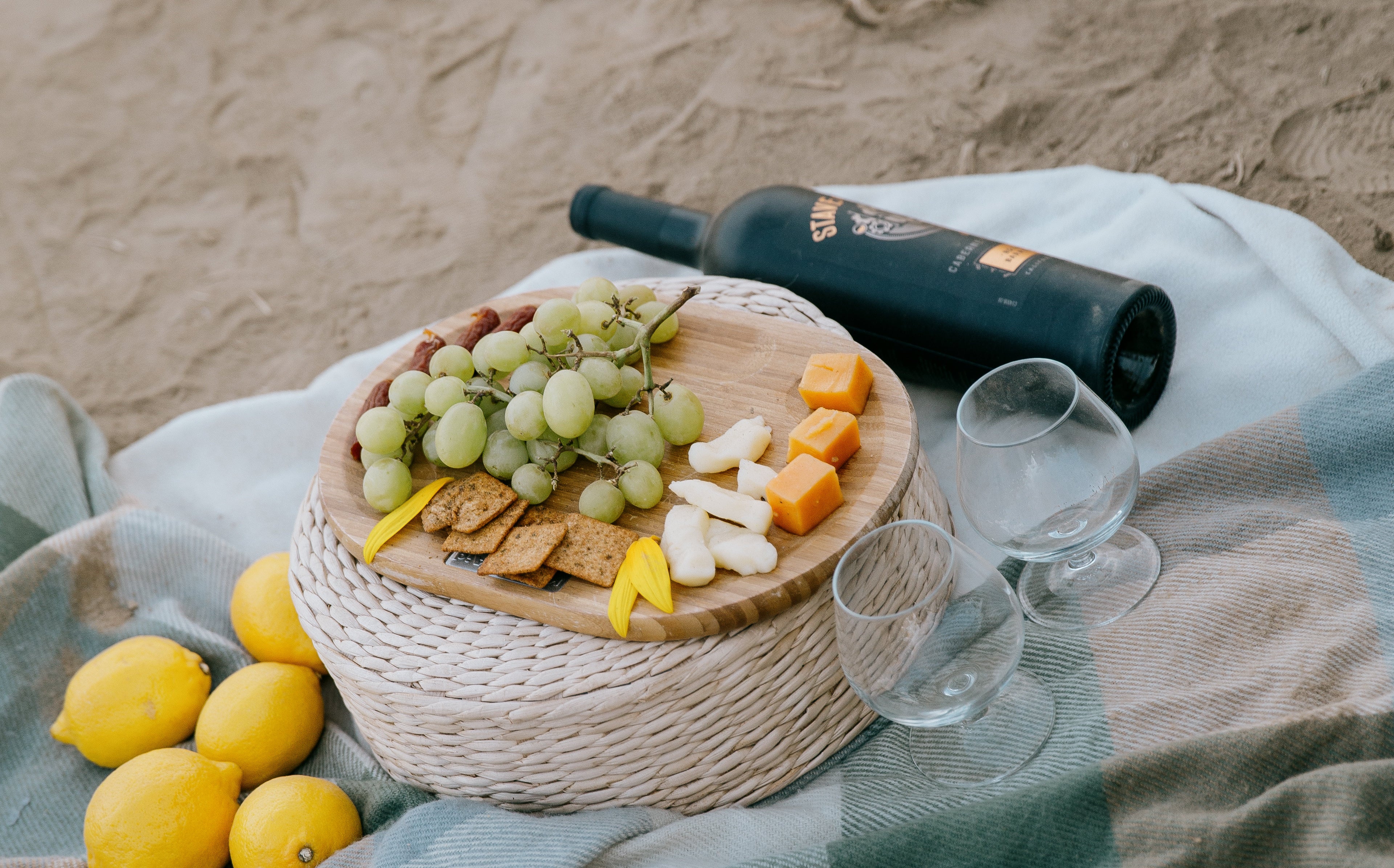 http://comfy-cozy.com/cdn/shop/collections/wine-and-cheese-picnic-on-the-beach.jpg?v=1645451340