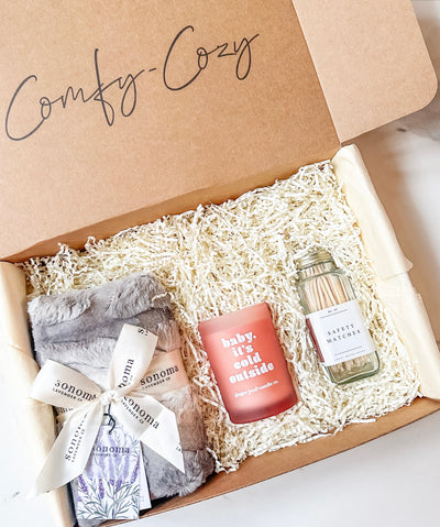 Introducing our "Warm & Chic Gift Bundle," the perfect gift package to bring warmth and style into your loved one's life. This thoughtfully curated gift box from Comfy-Cozy.com combines luxurious comfort with trendy accents, creating an unforgettable experience of relaxation and charm.