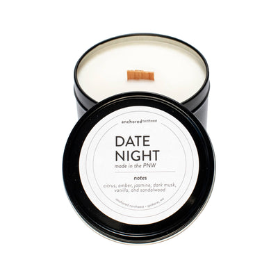 Date Night Wood Wick Travel Tin Candle.  The perfect candle for Valentines Day!  Notes: Ozone, Jasmine, Leather, Patchouli, Sandalwood, Tonka Bean, Amber, Dark Musk, Light Musk, Powder Ingredients  6oz Metal Travel Tin Untreated Cedar Wood Wick 100% Soy Wax grown in the US.  Fragrance and Essential Oil Blend Dye and Phthalate free Our wood wick, triple scented, 100% soy wax candles are hand poured in Spokane, WA. We use real ingredients in our candles 
