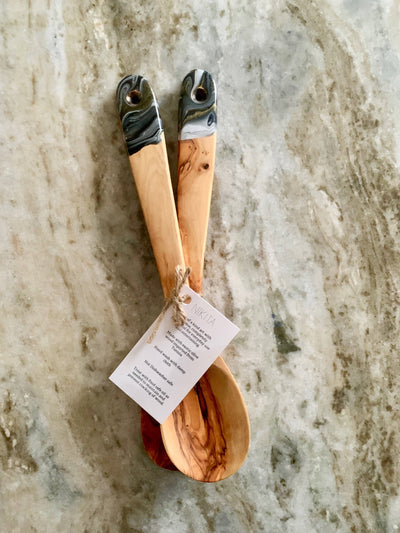 Olive wood Spoon set of 2, in a black, white and gold color.  12" Long.  NOTE: These pictures associated with the items are for representative purposes only. A similar item will be hand-crafted. Your piece will all be one of a kind. Each original is created with decorative ArtResin which is food safe nontoxic.  Although the resin is scratch resistant, marks will occur if enough pressure is used.  entertaining gift, resinart, gift