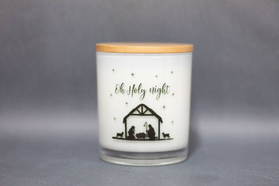 The reason for the season! This printed candle reads "Oh Holy Night" with a delicate nativity scene. This beauty will be the perfect addition to any home this holiday season.  Printed Designs provide any home with a beautiful décor item while filling the room with a beautiful fragrance! We print directly onto the milky-white glass vessel to give a crisp, clean look to each candle.